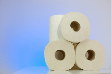 Toilet paper on a blue background.Purchase and shortage of toilet paper.Cleanliness and health. crisis of the paper industry in Europe.