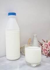 Fresh milk dairy in bottle with milk glass