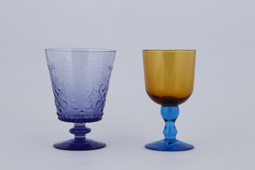 Translucent glass cups with detailed abstract pattern