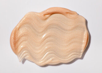 golden beige shimmering make up base smear, acryl gel, glossy peach nail polish, cosmetics beauty product texture, liquid blush, foundation brightening, face cream, highlighter