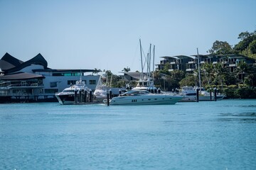 tourist boats and tour boats in the whitsundays queensland, australia. travellers on the great...