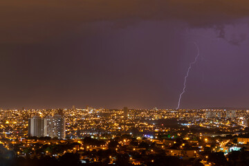 Naklejka na ściany i meble Aerial view of the Goiania Goias with a lightning