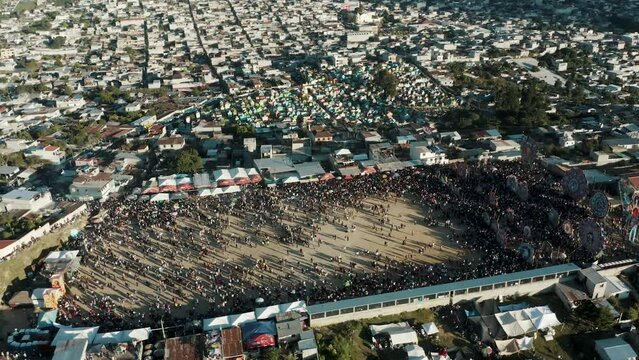 People Joining The Annual Sumpango Kite Festival In Honoring Dead Ancestors In Guatemala. Aerial Drone