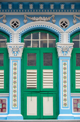 Close up of ornate facade of prewar shophouse