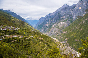 Tiger Leaping gorge between Jade Dragon Mountain or Yulong Mountain and Haba Mountain at...