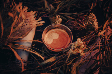 cup of coffee with Australian native flowers 