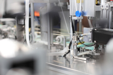 Industry and factory concept, medical face mask production line.