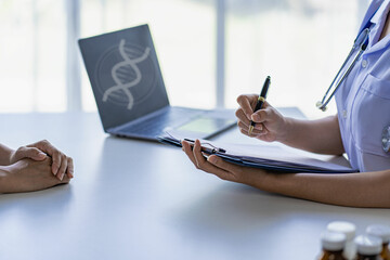 Naklejka premium drug concept health care and people Doctor talking to patient in clinic office