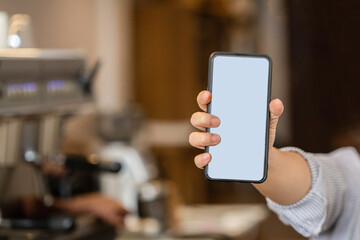 person hand holding smartphone