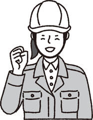 ヘルメット作業着姿の女性_ガッツポーズ