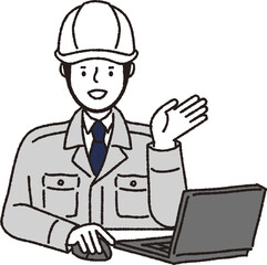 ヘルメット作業着姿の男性_パソコン