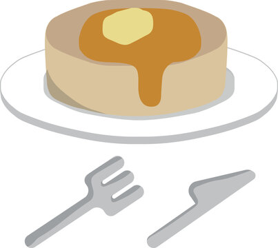 お皿に乗った分厚いパンケーキとナイフとフォーク