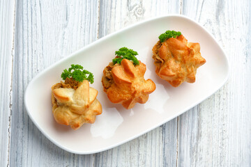 Profiteroles stuffed with soft mousse banquet food snacks