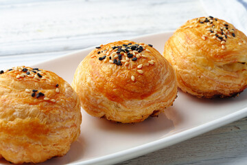 Homemade turkish piesl pogaca with sesame seeds