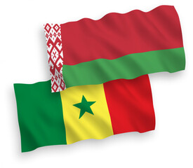 National vector fabric wave flags of Republic of Senegal and Belarus isolated on white background. 1 to 2 proportion.