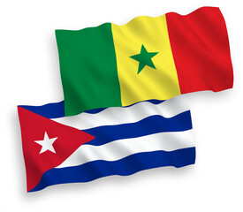 National vector fabric wave flags of Republic of Senegal and Cuba isolated on white background. 1 to 2 proportion.