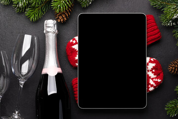 Tablet with blank screen and Christmas decor
