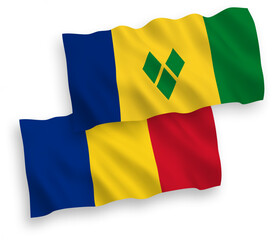 National vector fabric wave flags of Romania and Saint Vincent and the Grenadines isolated on white background. 1 to 2 proportion.