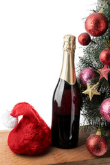 The champagne bottle with Santa hat and Christmas tree