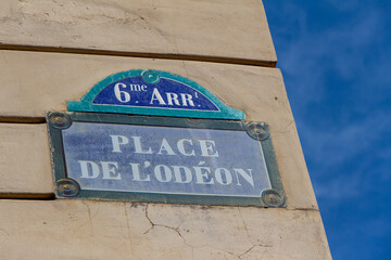 Obraz premium Place de l'Odeon street sign, one of the most famous squares in Paris, France.