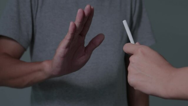 man stop smoke, refuse and break take cigarette. wold tobacco day and quit smoke. Lung Cancer, Respiratory, emphysema ,cardiovascular disease, Pulmonary disease, pneumonia, narcotic, nicotine effect