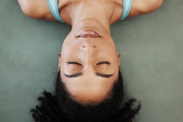 Black woman, yoga and meditation training, calm mindset and zen balance on the floor, top view and...