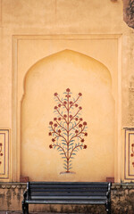 Colorful Indian designs on walls in Jaipur India Amber Fort