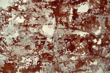 Naklejka premium Paint peel off in wall. Old rusty texture.