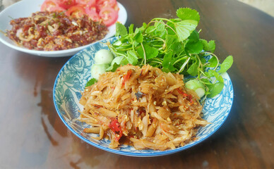 Thai Food, Isaan Food Dishes, Spicy Bamboo Shoot Stir Fried with vegetables. Stri fried pre boiled bamboo shoot and minced pork