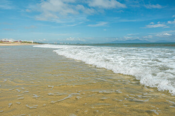 Tropical landscape of summer scenery. Beach with blue sky and white clouds background. Summer vacation travel concept.