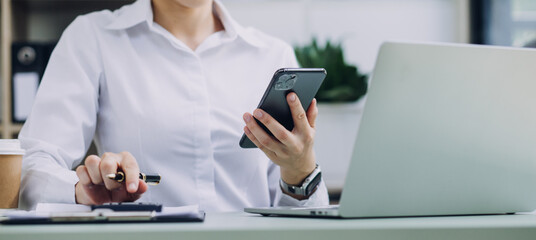 Fototapeta premium Business team present. Photo professional investor working new startup project. Finance meeting.Digital tablet laptop computer smart phone using, keyboard docking screen foreground,filter