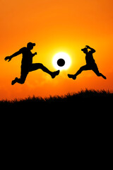 Fototapeta na wymiar Portrait silhouette of a man having fun playing soccer.