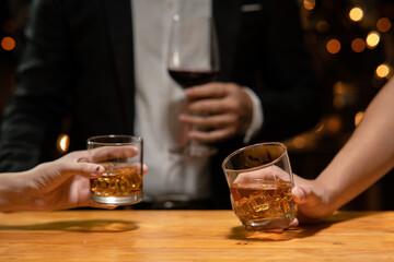 Barman pouring whiskey whiskey glass beautiful night