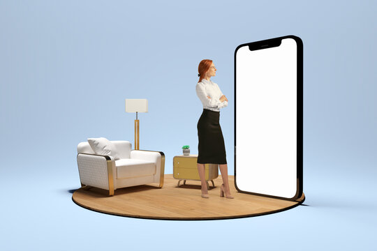 Young girl standing in front of huge 3d model of cellphone with blank white screen and thinking isolated on blue background. Online working, payment, new app
