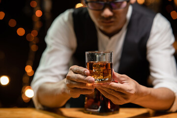 Barman pouring whiskey whiskey glass beautiful night