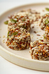 Close up  of some honey and seeds bars, called kozinaki