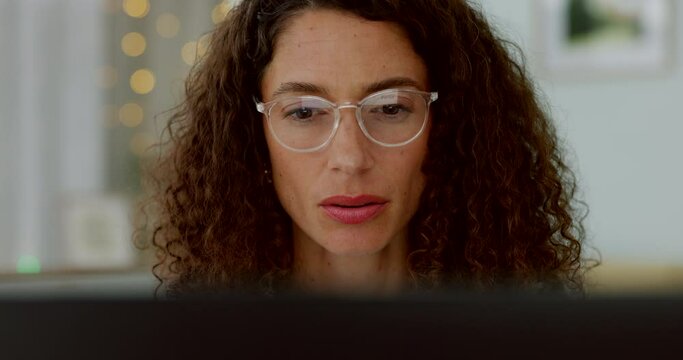 Woman, glasses and working on pc to start digital marketing innovation for business. Black woman, tech design vision and blue light reflection or employee eye care for reading online on computer