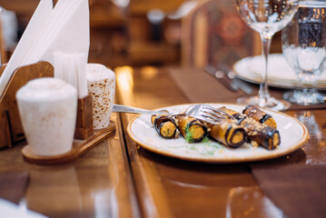 Laid table in the restaurant. Beautiful serving. Reserved table in the restaurant.