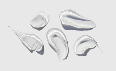 cosmetic smears cream gel texture on a light background