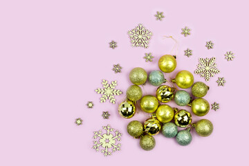 Festive composition. Golden balls and snowflakes.christmas background with decorations, flat lay,Copy space