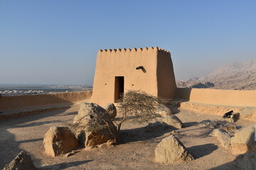 Dhayah Fort, a castle-like structure, is on the UNESCO World Heritage Tentative List and stands proud amidst the arid mountains, United Arab Emirates, Ras Al Khaimah.