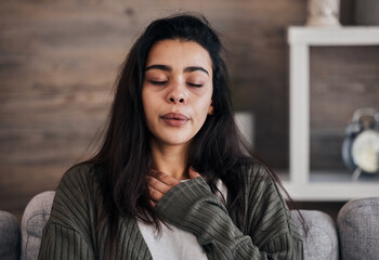 Depression, sad and woman with eyes closed in home thinking of problems. Anxiety, mental health and unhappy, depressed and lonely female on sofa in living room trying to calm down and relax in house. - obrazy, fototapety, plakaty