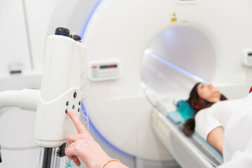 Medical CT or MRI Scan in the modern hospital laboratory. Interior of radiography department. Technologically advanced equipment in white room. Magnetic resonance diagnostics machine