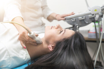 Ultrasound scanner in the hands of a doctor. Diagnostics. Sonography.