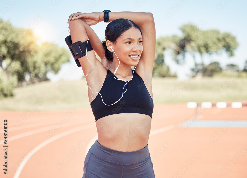 Canvas Prints Woman runner, earphones and stretching arms on track for sports, fitness or workout in sunshine. Black woman athlete, warm up and ready for running, exercise and training on field in summer for sport