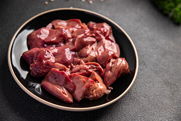 chicken liver fresh raw offal delicious snack mortadella, pistachios, ham healthy meal food snack diet on the table copy space food background rustic top view