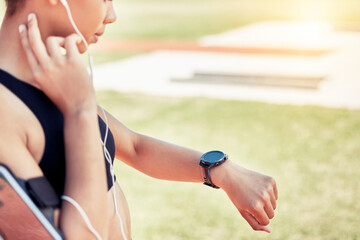 Smartwatch, pulse and woman runner training for a race, competition or marathon on a field....