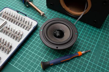 Process of repairing a broken audio speaker.