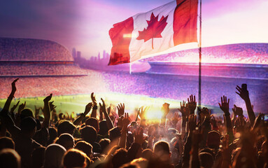 football or soccer fans and Canada flag at a game in a stadium - obrazy, fototapety, plakaty