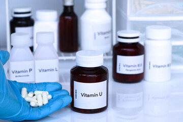 vitamin U pills in a bottle, food supplement for health